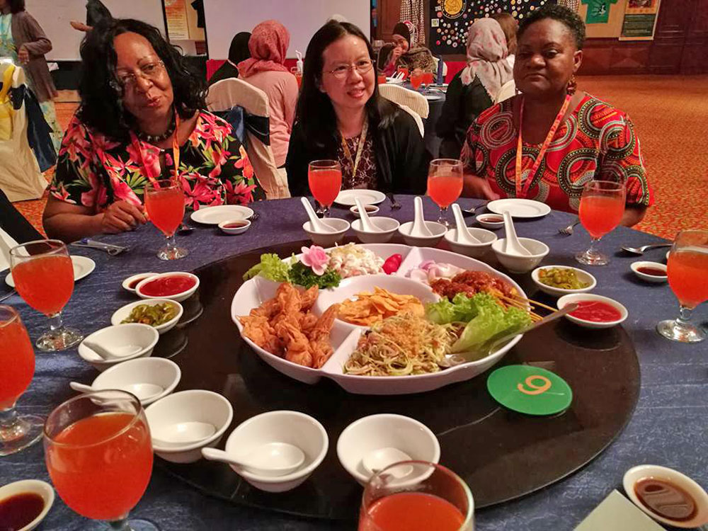 Rufaro Madzima (Zimbabwe),May Loong (Malaysia) and Armanda (Mozambique) at the Welcome Dinner